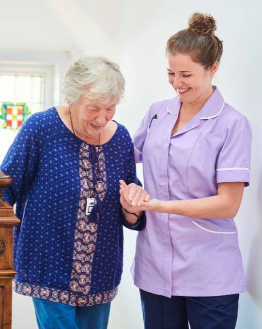 In-home caregiver helping a senior at home in Michigan City, Indiana
